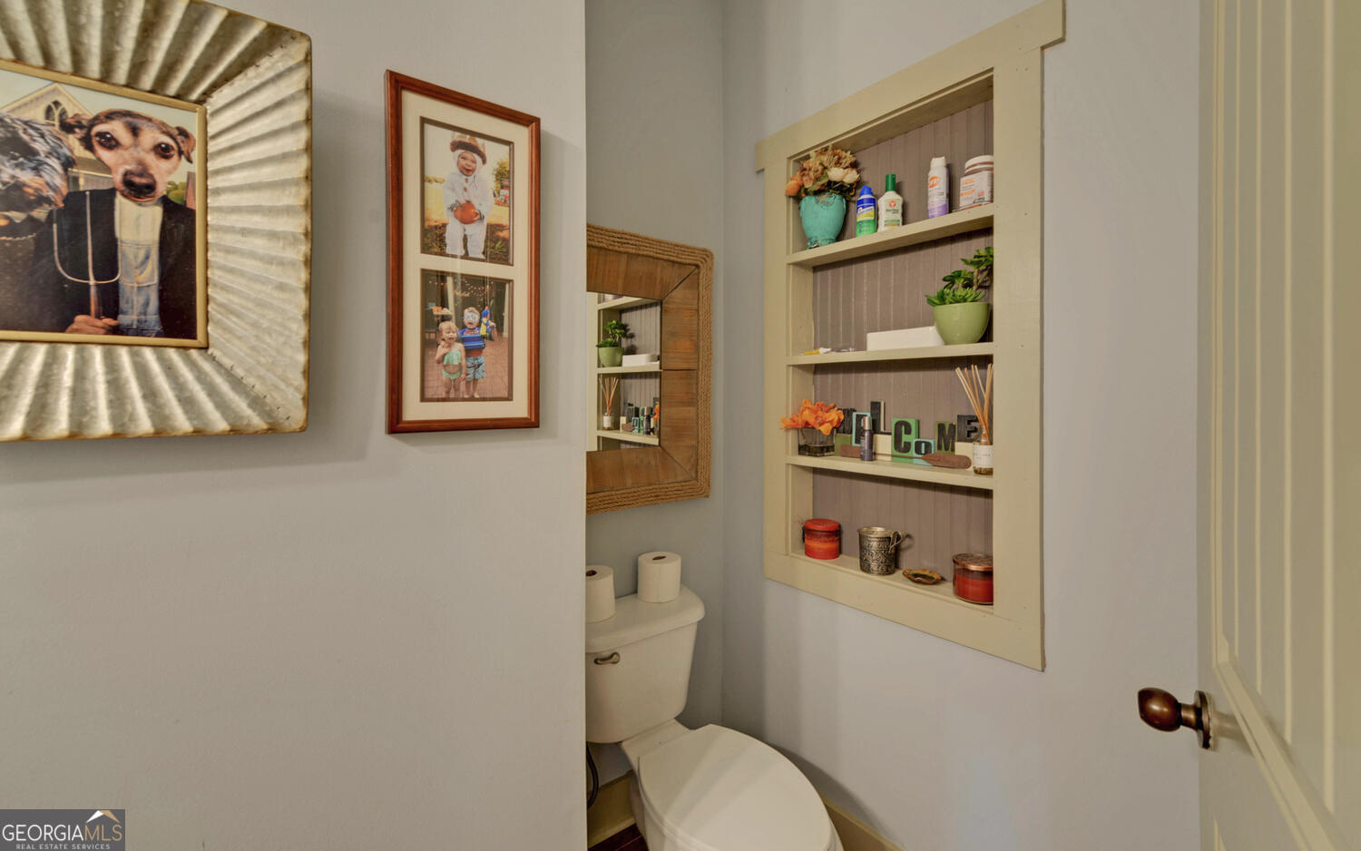 819 Tranquility Lane Hartwell, GA 30643 - Photo 22 of 81 a white toilet sitting next to a bathroom sink