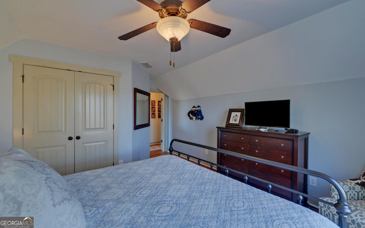 819 Tranquility Lane Hartwell, GA 30643 - Photo 32 of 81 a bedroom with a bed and a television