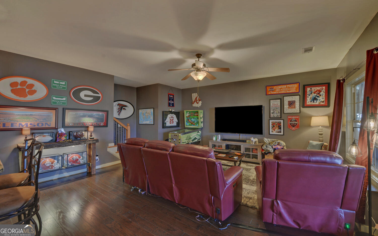 819 Tranquility Lane Hartwell, GA 30643 - Photo 47 of 81 a living room with furniture and a flat screen tv