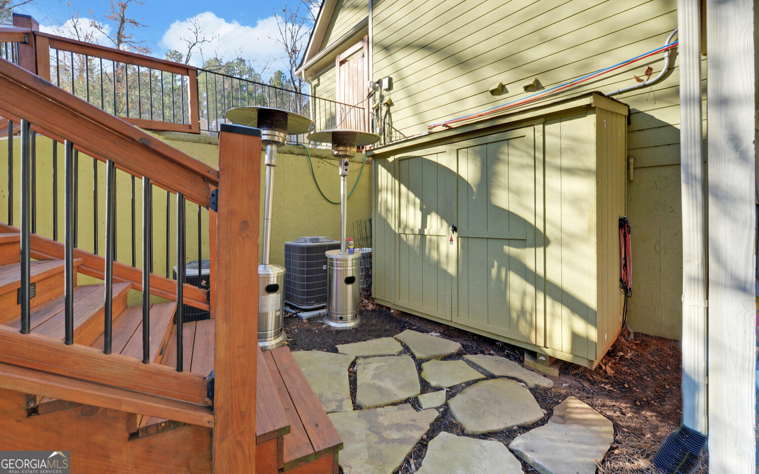 819 Tranquility Lane Hartwell, GA 30643 - Photo 56 of 81 a view of a porch with wooden floor and furniture