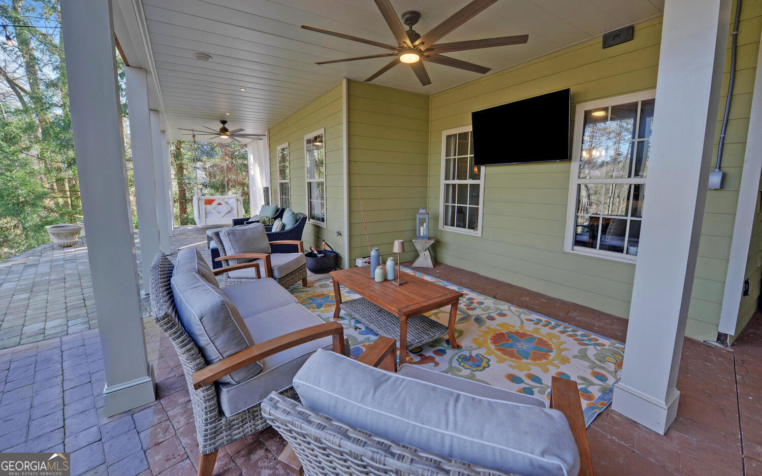 819 Tranquility Lane Hartwell, GA 30643 - Photo 58 of 81 a living room with furniture and a flat screen tv