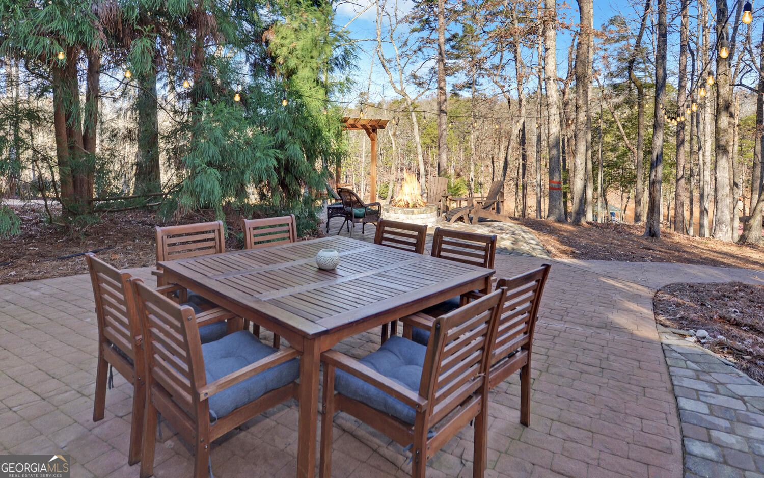 819 Tranquility Lane Hartwell, GA 30643 - Photo 61 of 81 a view of a backyard with a patio and outdoor seating