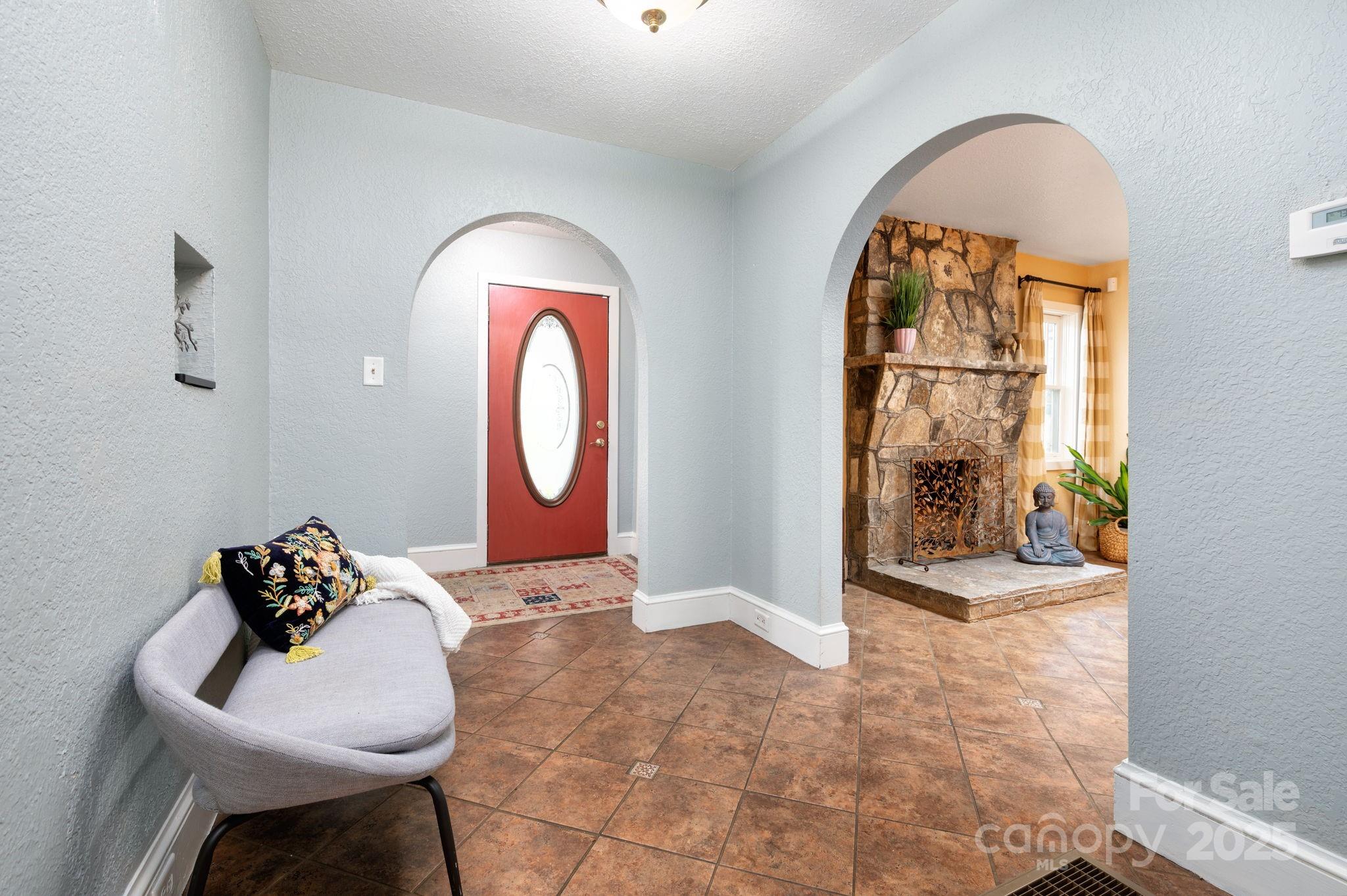 115 Oakland Road Asheville, NC 28801 - Photo 21 of 32 a view of entryway with furniture and a window