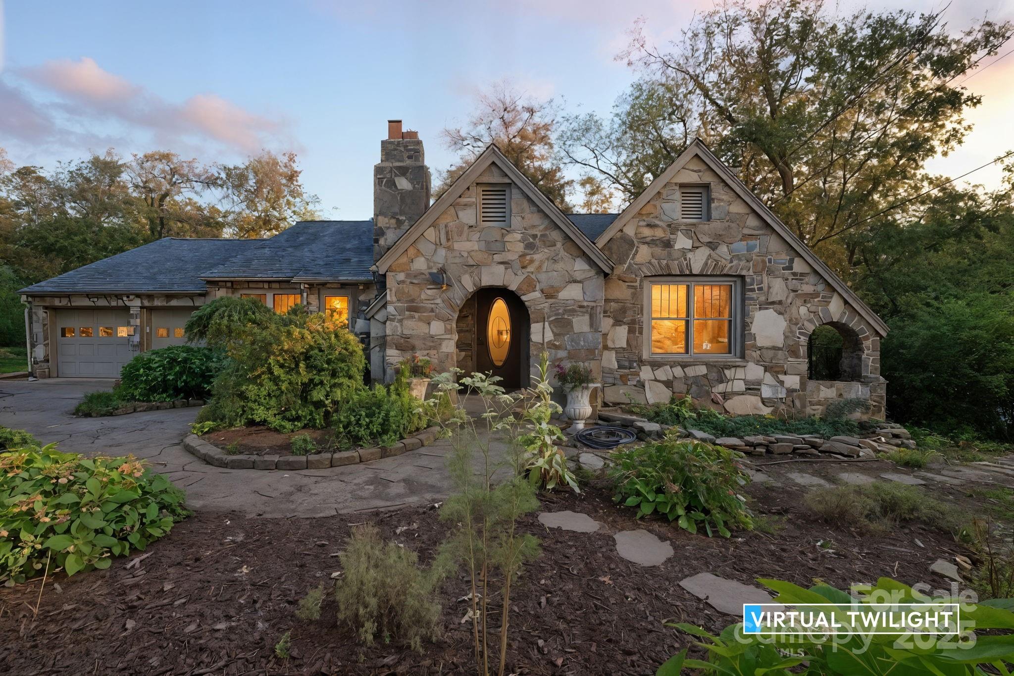 115 Oakland Road Asheville, NC 28801 - Photo 29 of 32 a front view of a house with garden