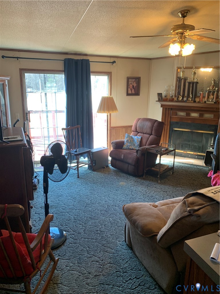 15532 Sandy Field Road Stony Creek, VA 23882 - Photo 11 of 20 a living room with furniture and a window