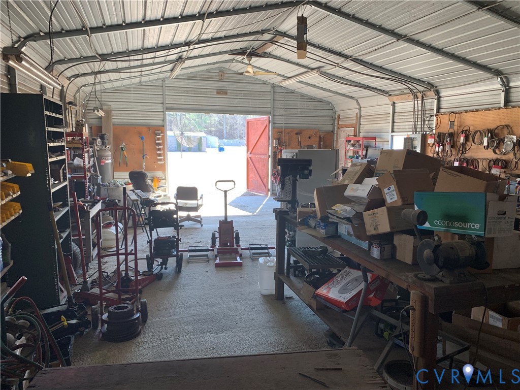 15532 Sandy Field Road Stony Creek, VA 23882 - Photo 20 of 20 a view of a chairs and tables in patio