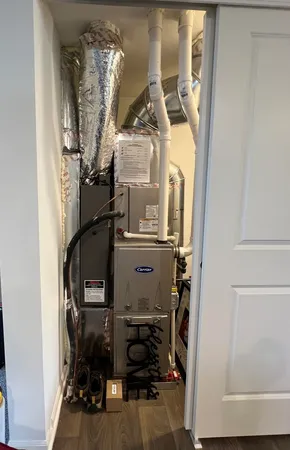 a view of storage and utility room with racks on the wall