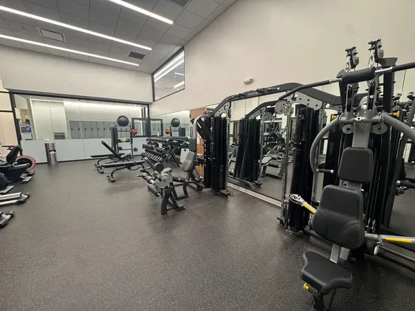 a view of a room with gym equipment