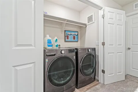 a view of living room washer and dryer