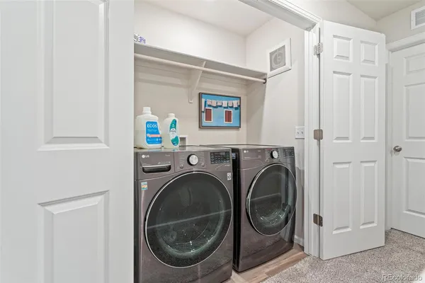 a view of living room washer and dryer