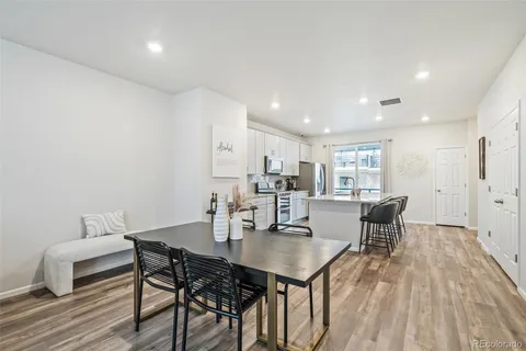 a view of a dining room with furniture