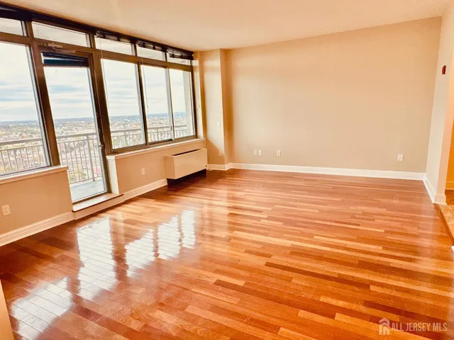 a view of city with ocean