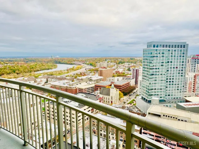 a view of a room with wooden floor and small space