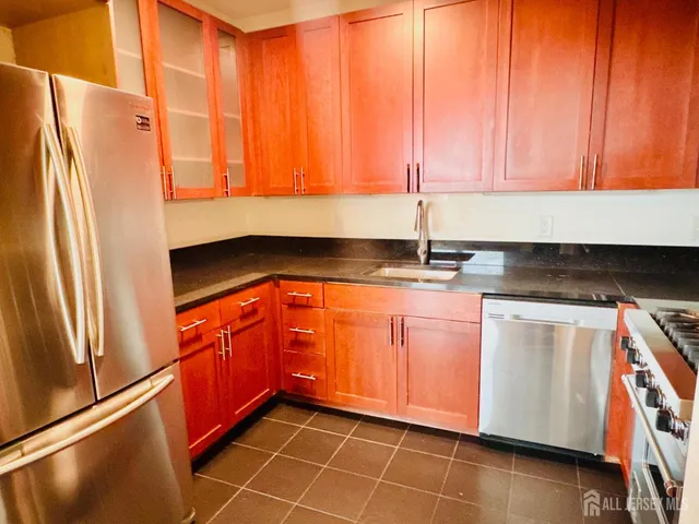 a bathroom with a shower and a bath tub