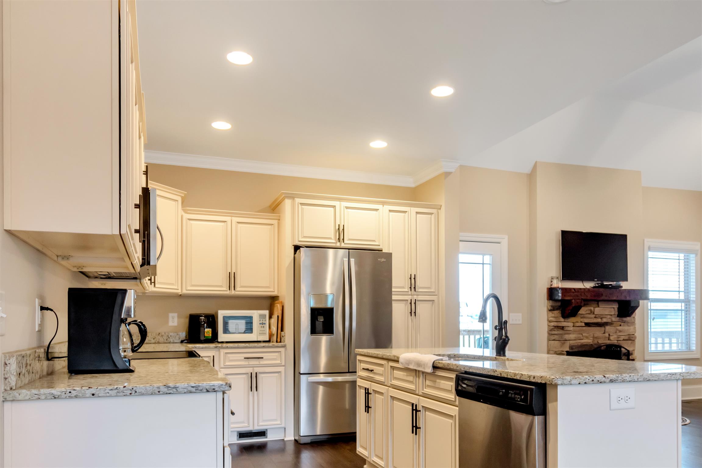 2935 Turner Road Watertown, TN 37184 - Photo 2 of 17 a kitchen with granite countertop a refrigerator stove microwave and sink