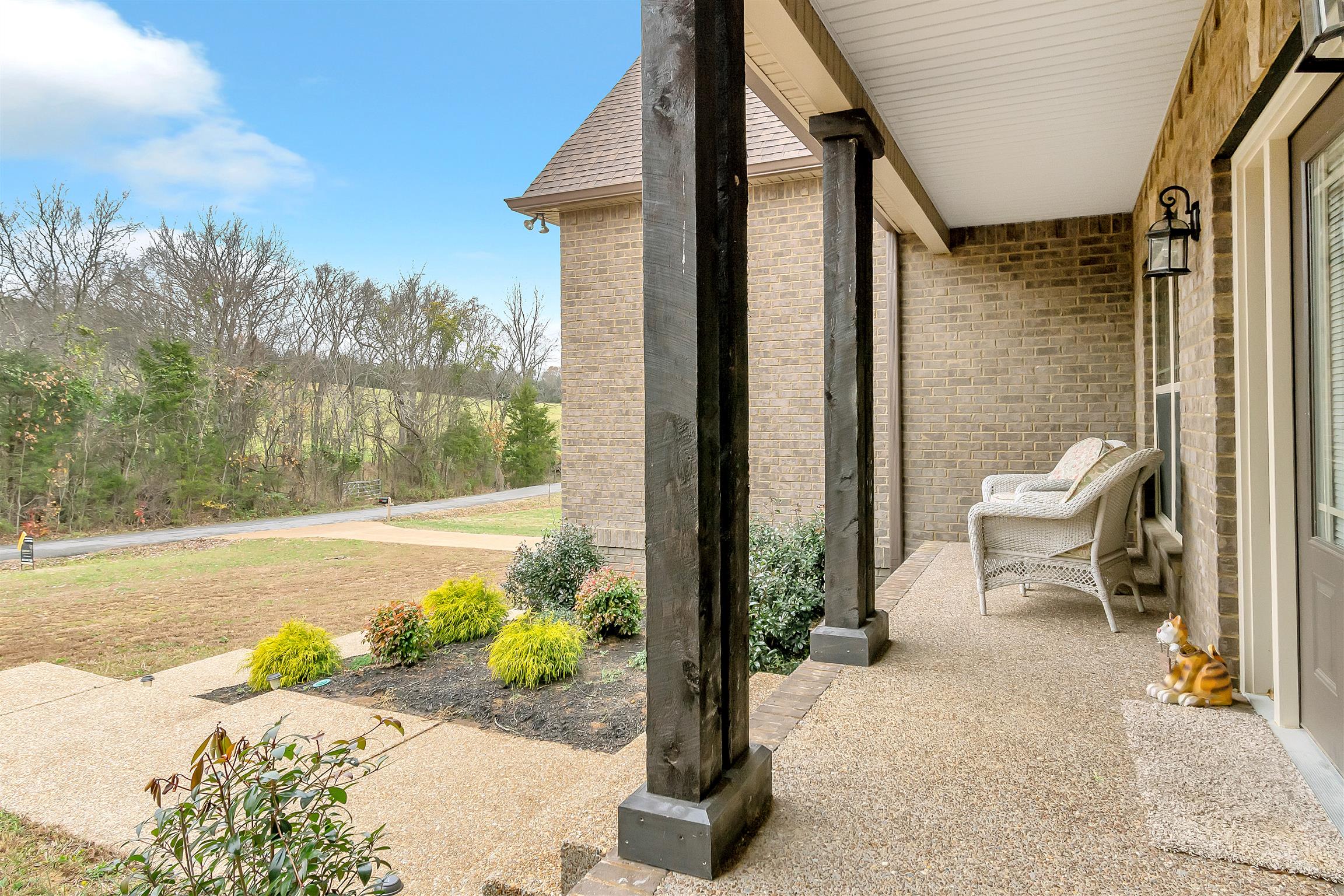 2935 Turner Road Watertown, TN 37184 - Photo 14 of 17 a view of a patio with table and chairs near a yard