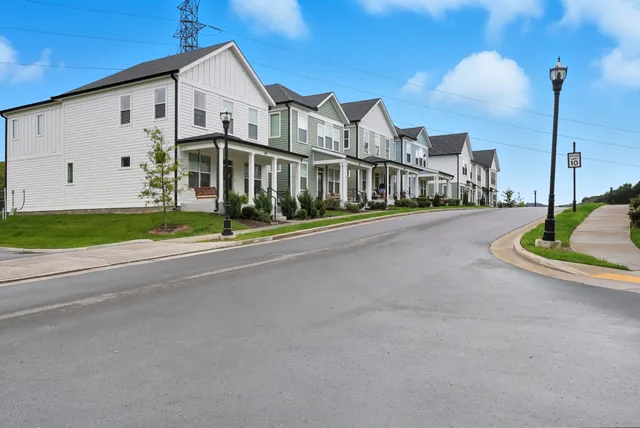 a view of a street in front of house
