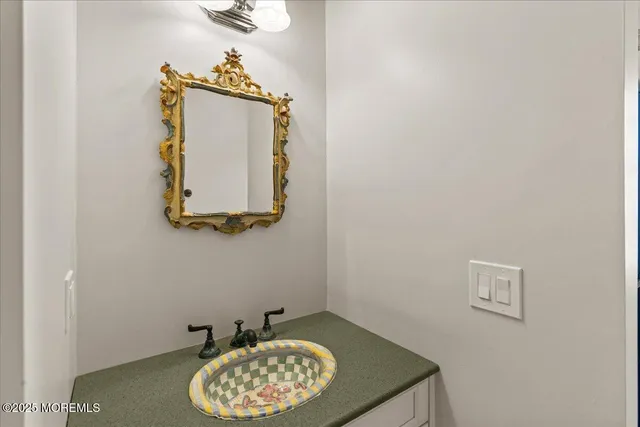 front view of a brick house with a yard