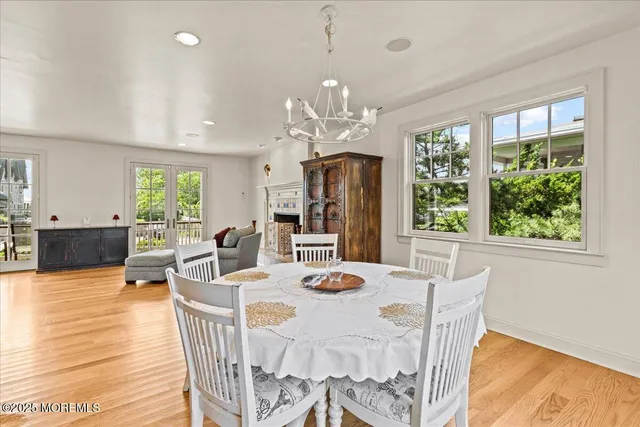 a kitchen with granite countertop a sink stainless steel appliances and cabinets