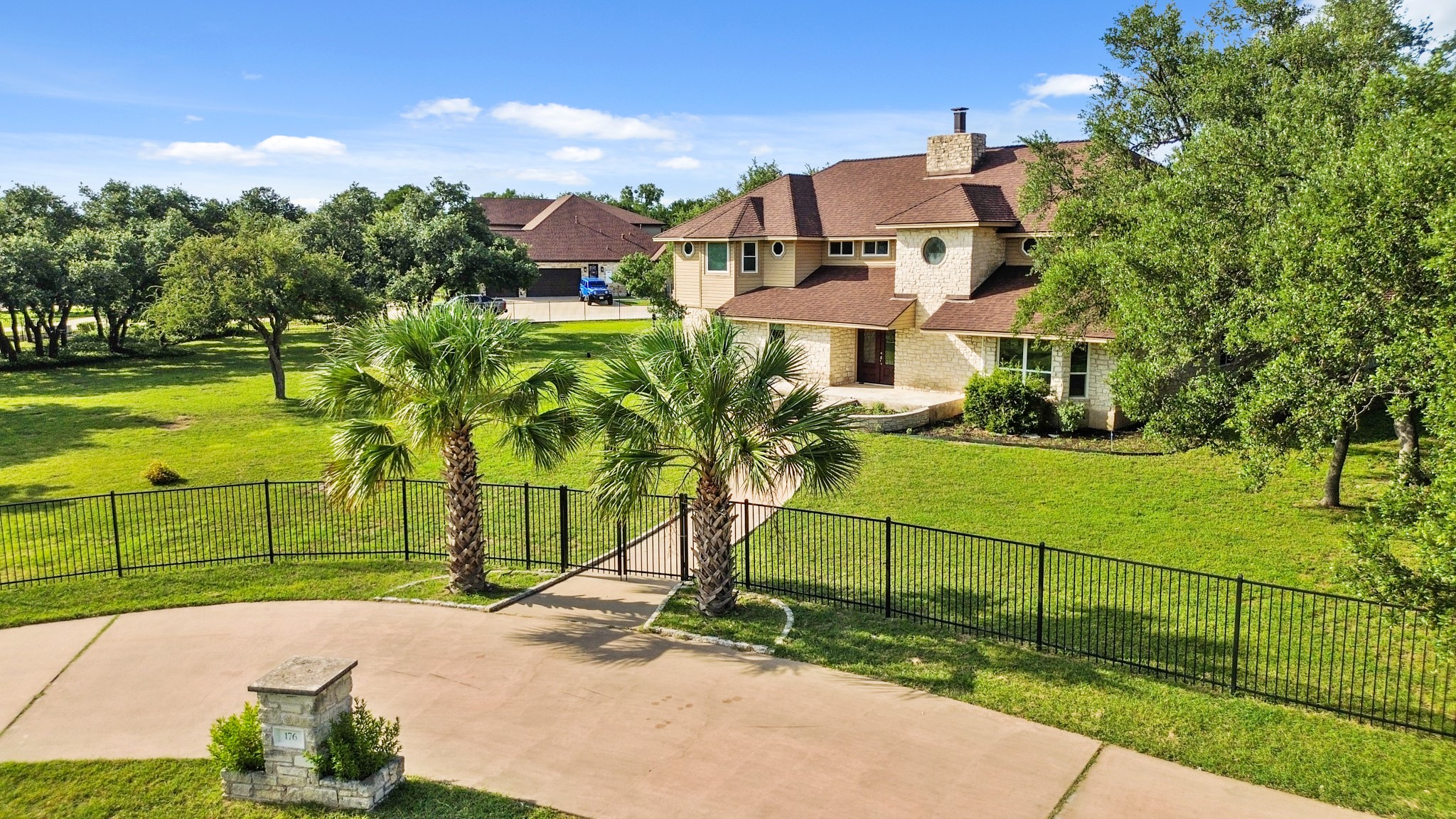 176 Logan Ranch Road Georgetown, TX 78628 - Photo 37 of 38 View of community featuring a gate