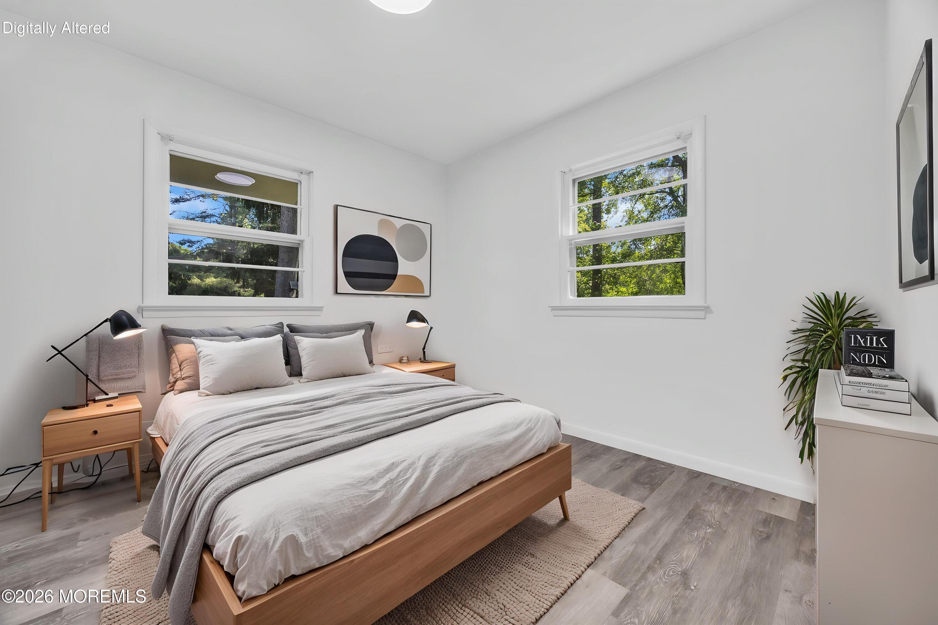 416 Oak Tree Road Freehold, NJ 07728 - Photo 13 of 46 a bedroom with bed window and flowerpot