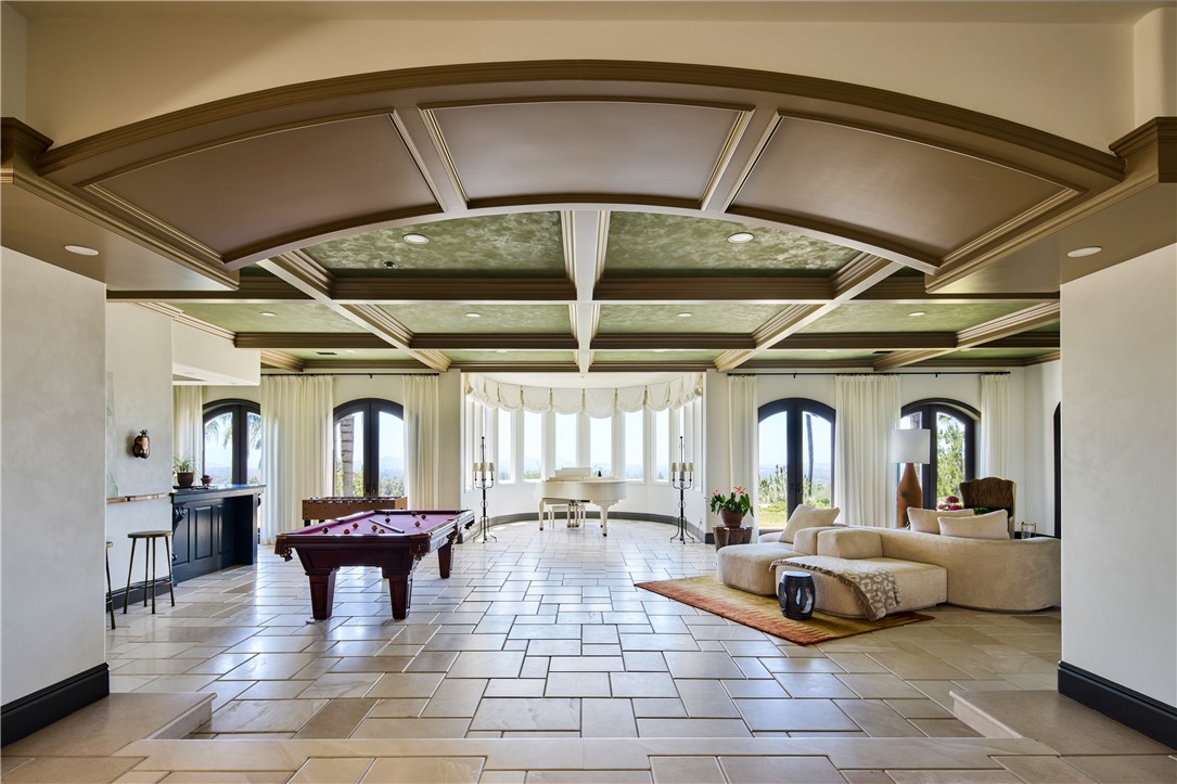 2019 Polo Court Riverside, CA 92506 - Photo 8 of 26 Living room features a fireplace, exansive westerly views, wet bar and piano alcove.