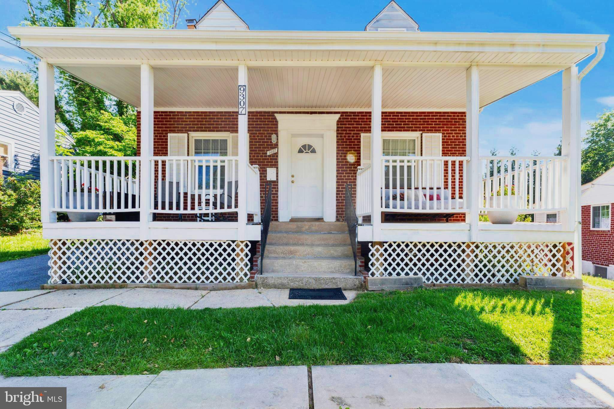 9307 Biltmore Drive Silver Spring, MD 20901 - Photo 1 of 33 a view of a wrought iron gate