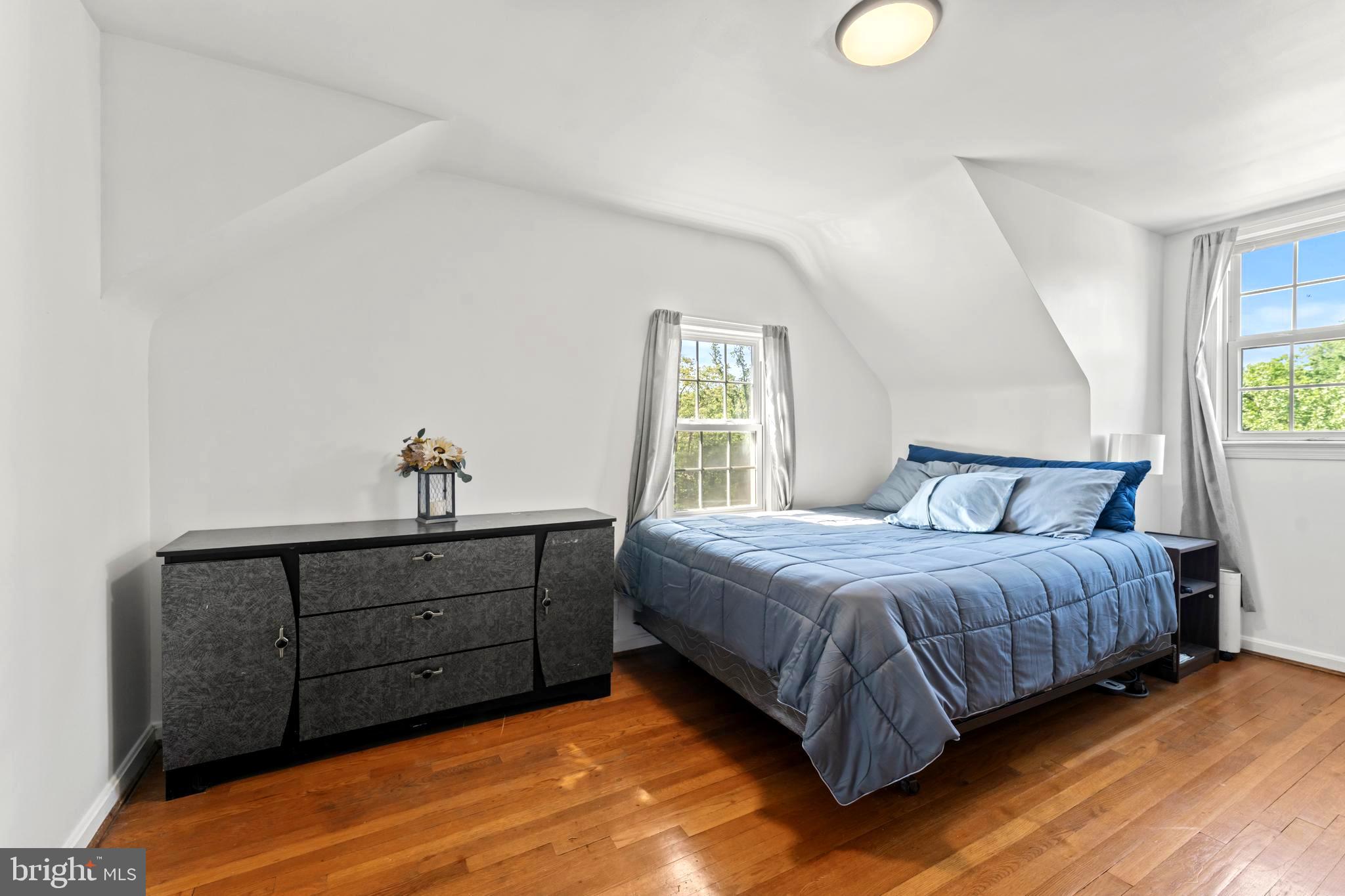 9307 Biltmore Drive Silver Spring, MD 20901 - Photo 11 of 33 a bedroom with a bed and window