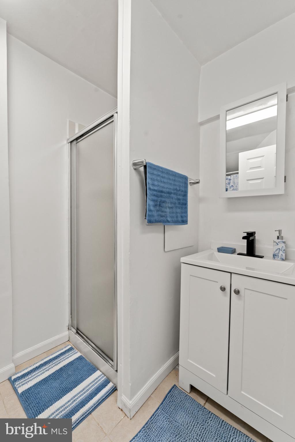 9307 Biltmore Drive Silver Spring, MD 20901 - Photo 20 of 33 a view of cabinets with wooden floor and cabinet