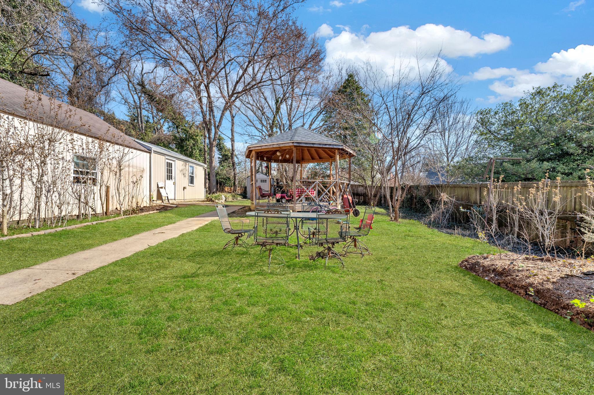 9307 Biltmore Drive Silver Spring, MD 20901 - Photo 23 of 33 a garden with wooden fence