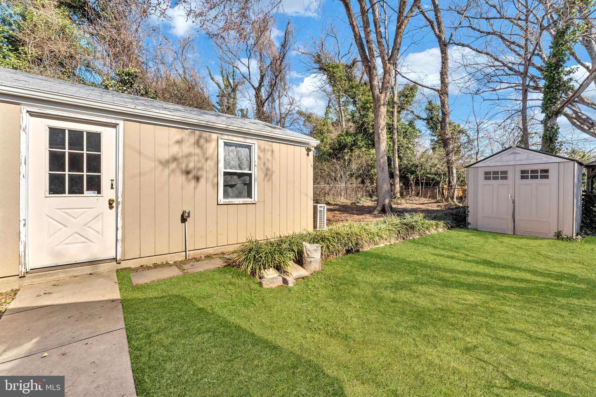 9307 Biltmore Drive Silver Spring, MD 20901 - Photo 25 of 33 a front view of a house with garden