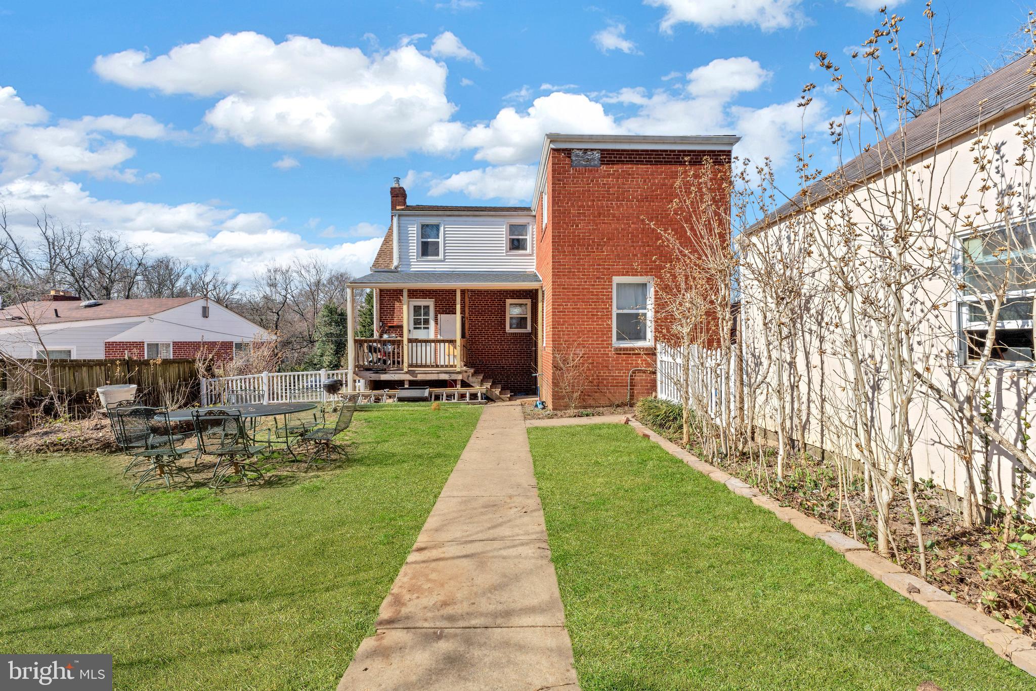 9307 Biltmore Drive Silver Spring, MD 20901 - Photo 27 of 33 a front view of a house with garden