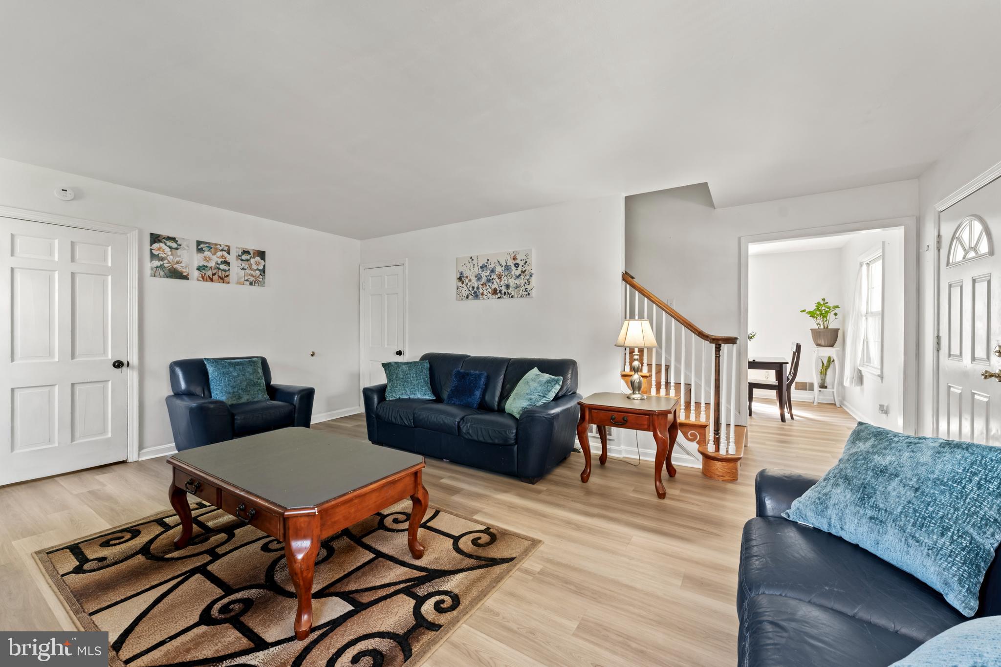9307 Biltmore Drive Silver Spring, MD 20901 - Photo 5 of 33 a living room with furniture and wooden floor
