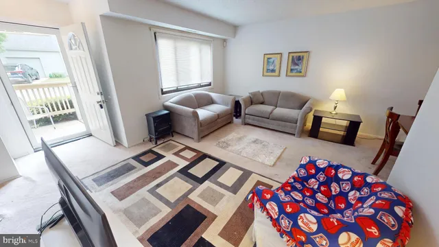a living room with furniture and a couch