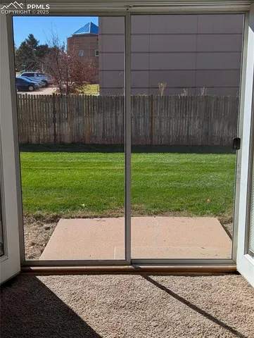 a view of a backyard with a garden