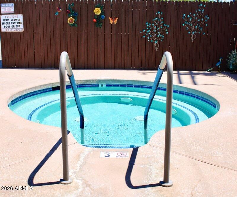 5437 East Butte Street Mesa, AZ 85205 - Photo 48 of 56 a picture of a bench in the patio