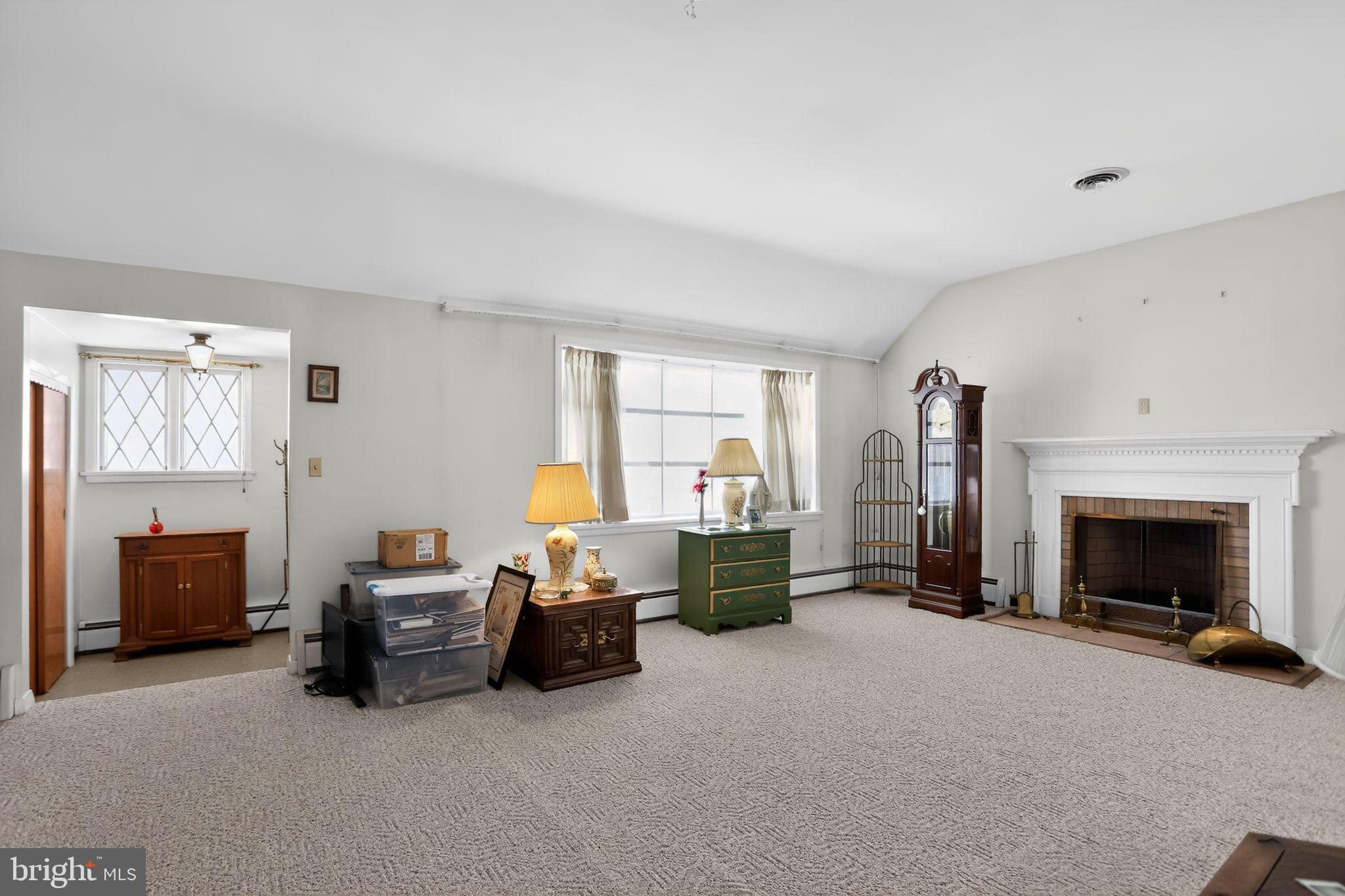 10 Taylor Street Bristol, PA 19007 - Photo 4 of 17 Spacious, bright living room with fireplace