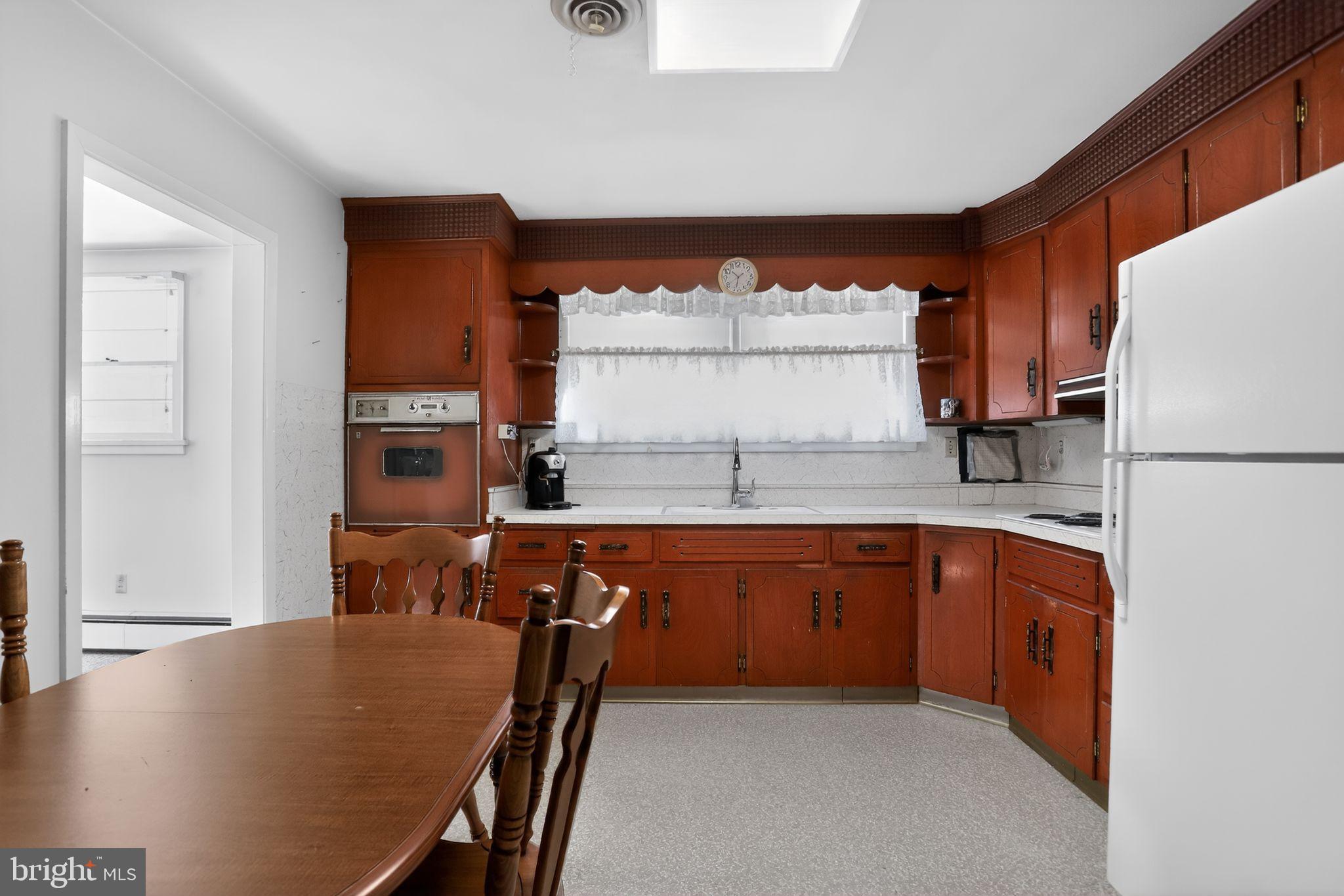 10 Taylor Street Bristol, PA 19007 - Photo 6 of 17 Spacious eat-in kitchen with ample cabinets