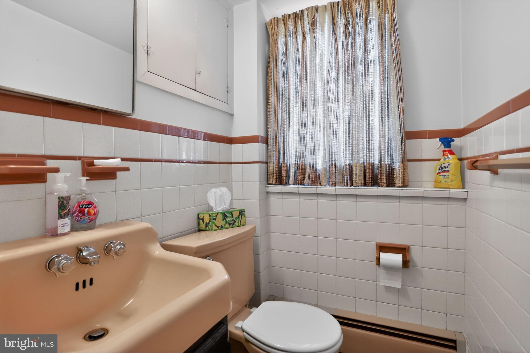 10 Taylor Street Bristol, PA 19007 - Photo 8 of 17 Powder room off the family room for quick visits