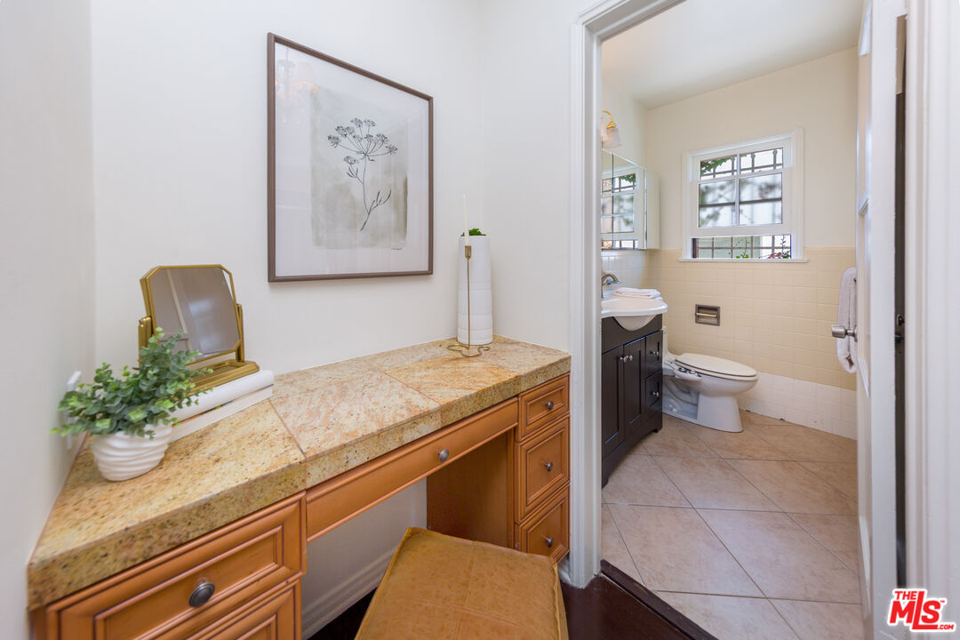 1904 Preuss Road Los Angeles, CA 90034 - Photo 12 of 32 a bath room with a toilet and a shower