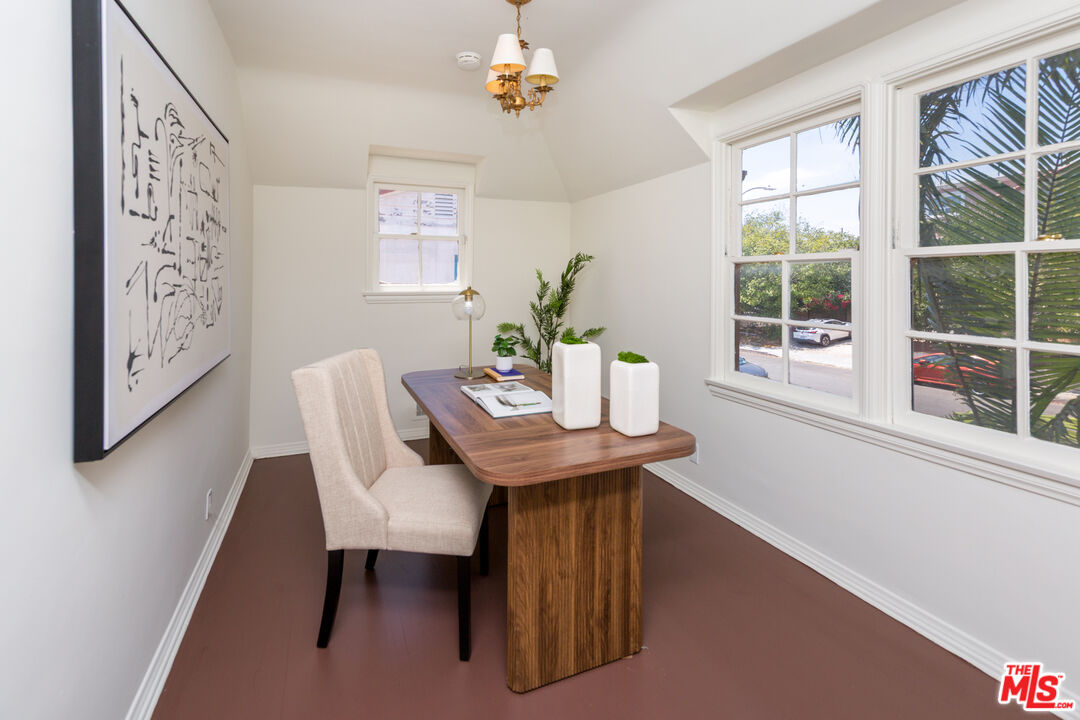 1904 Preuss Road Los Angeles, CA 90034 - Photo 19 of 32 a view of a workspace with furniture and a window