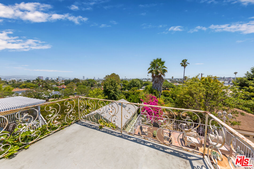 1904 Preuss Road Los Angeles, CA 90034 - Photo 23 of 32 a view of a balcony and an ocean view