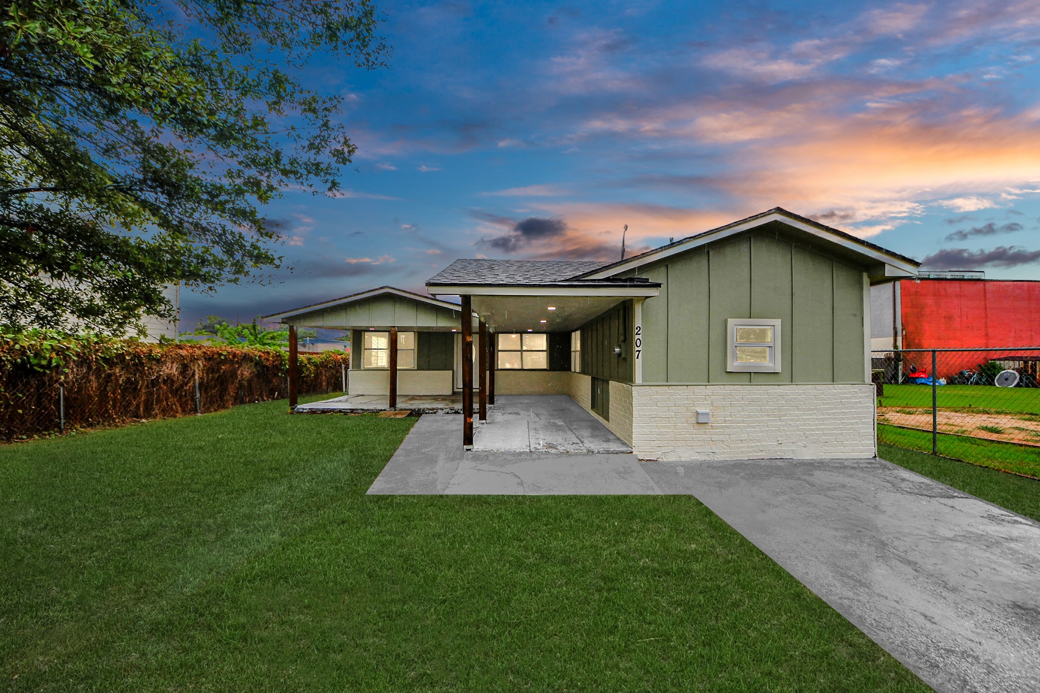 207 East Defee Avenue Baytown, TX 77520 - Photo 2 of 36 a view of an house with backyard and garden