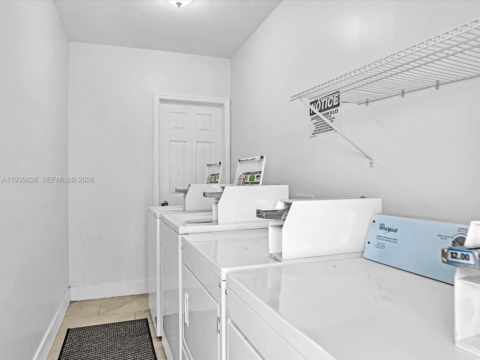1839 Funston Street, Unit 2 Hollywood, FL 33020 - Photo 20 of 21 a utility room with dryer and washer