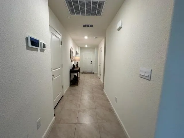 a hallway with windows