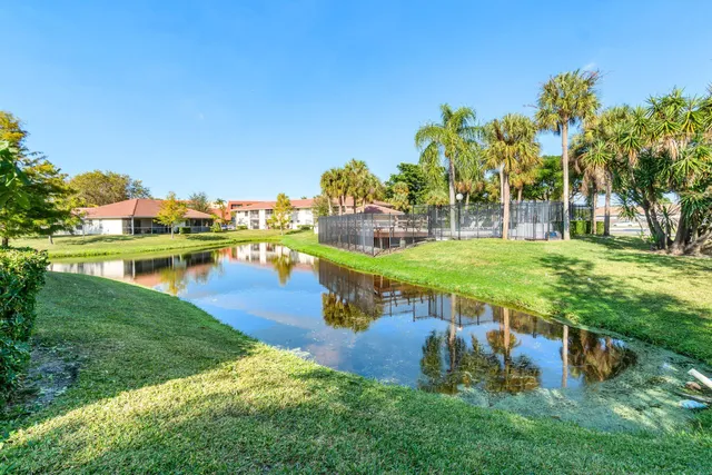 a view of a lake with a building in the background