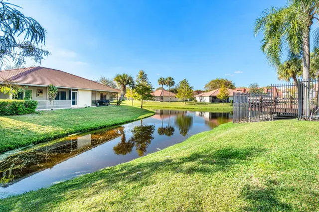 a view of a lake with a garden