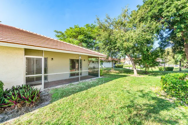 a view of backyard with green space