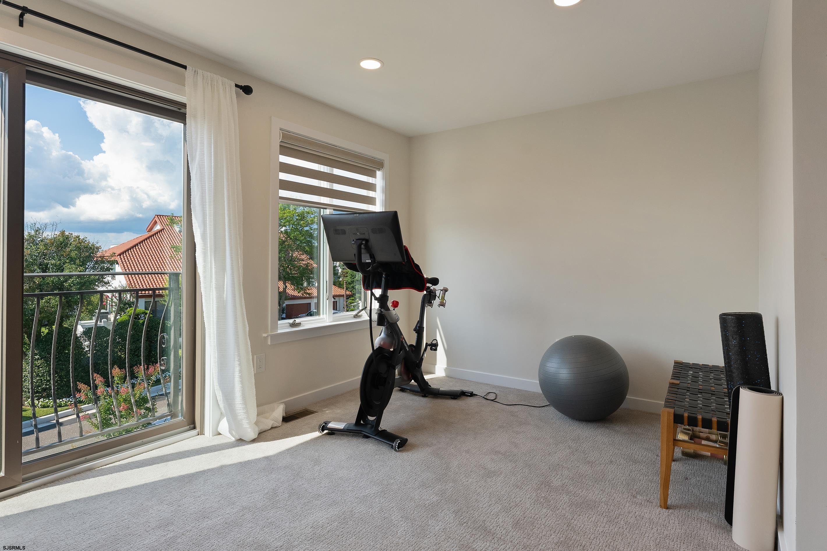 7600 Bayshore Drive, Unit SEPTEMBER 2026 Margate City, NJ 08402 - Photo 30 of 55 a view of a room with gym equipment