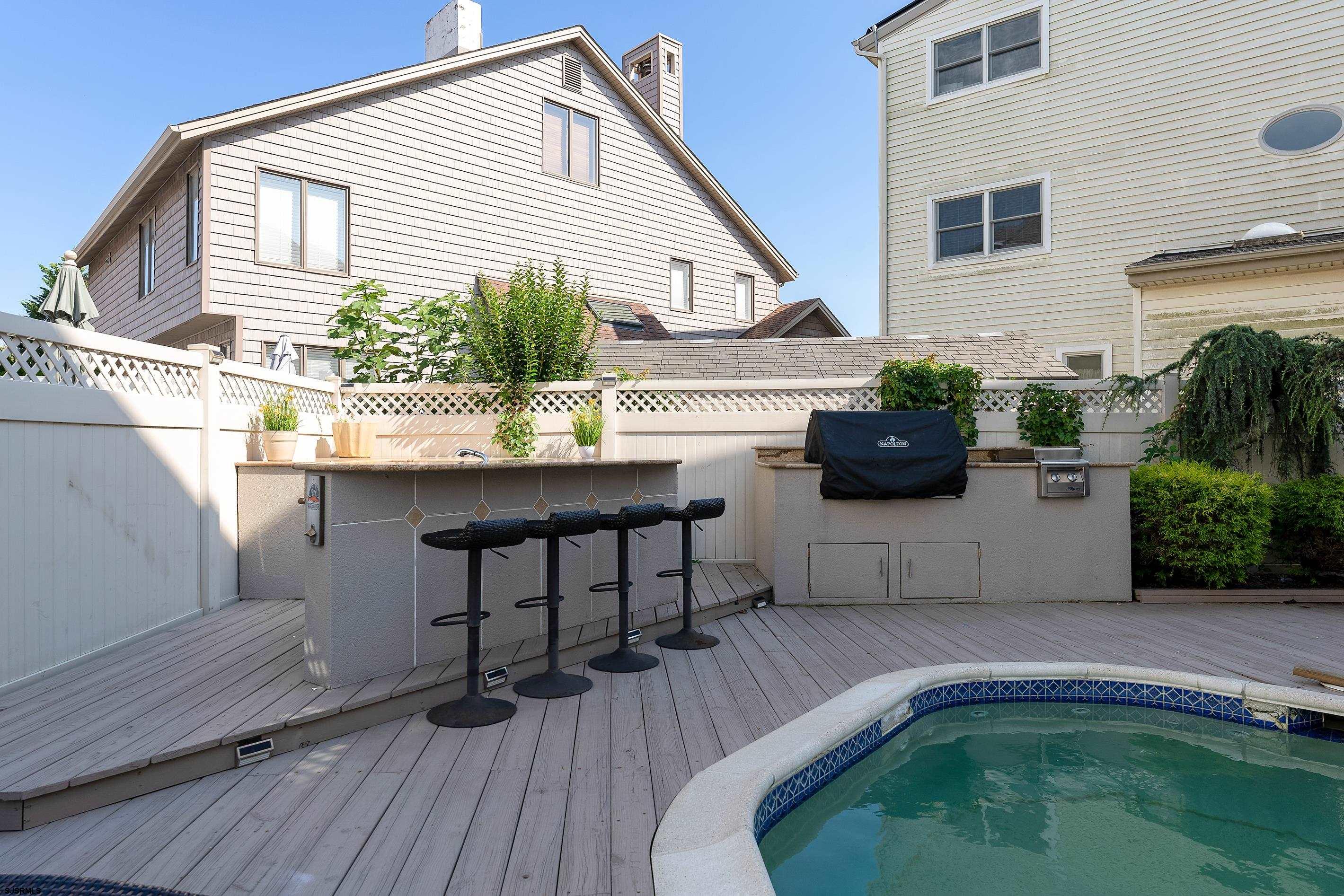 7600 Bayshore Drive, Unit SEPTEMBER 2026 Margate City, NJ 08402 - Photo 41 of 55 a house view with a outdoor space